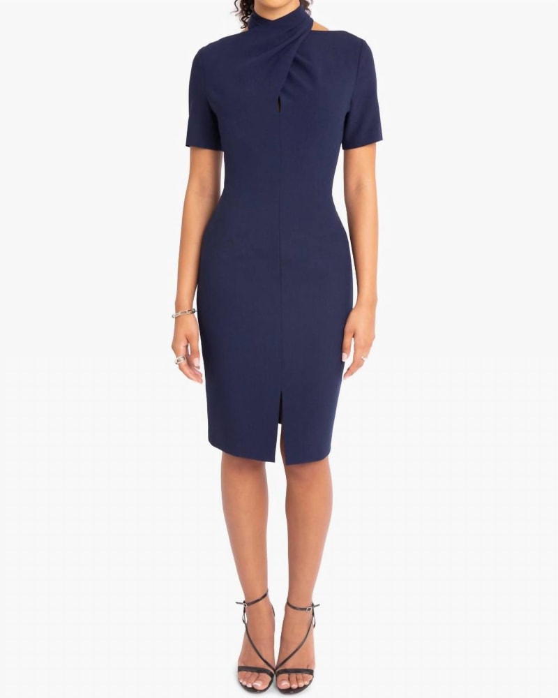 Front of a model wearing a size 12 Mercer Sheath Dress In Navy in Navy by Black Halo. | dia_product_style_image_id:345211